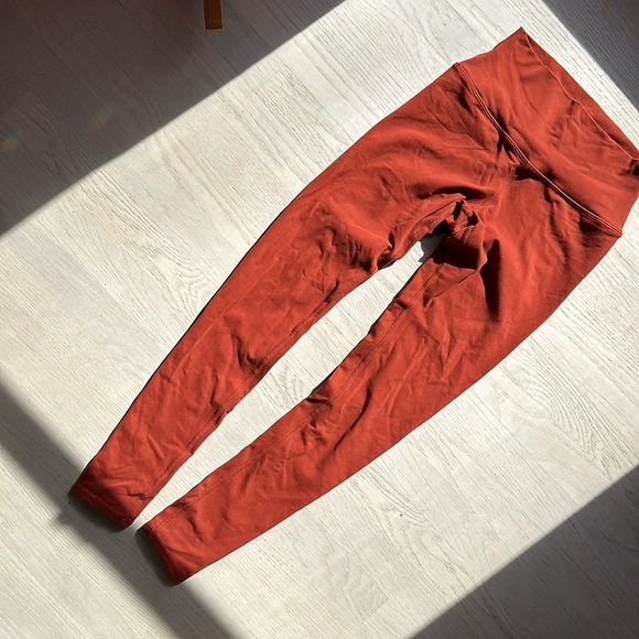 Alo leggings clear back seam red orange rust color. Worn & washed once. Size S. - Picture 7 of 7